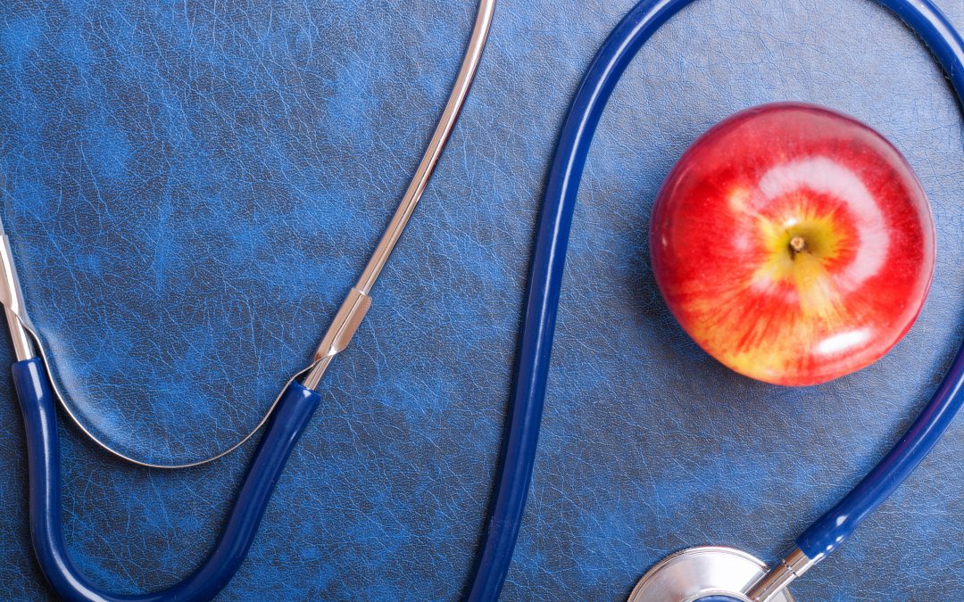 Stethoscope and apple - Simply Nourished | Food Coaching & Reiki, Melbourne VIC - simplynourished.com.au